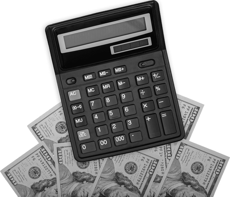 011 calculator laptop and dollar bills on colored back GBGGL83